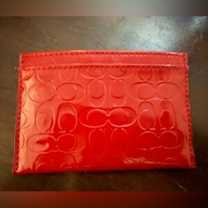 Red Embossed Coach leather Card Holder excellent condition never used trendy new